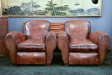 Pair of French leather club chairs with scroll back - pair two