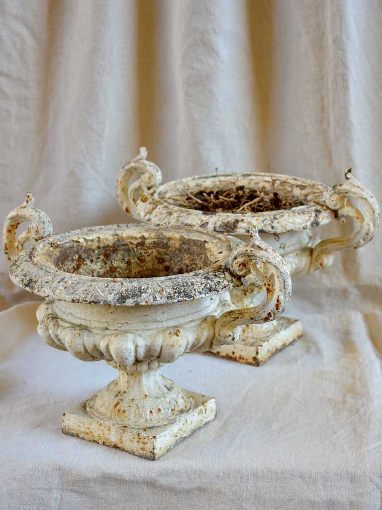 Pair of antique French Medici urns with handles