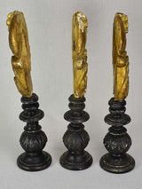 Collection of three salvaged gilt elements mounted on wooden supports 15¾"