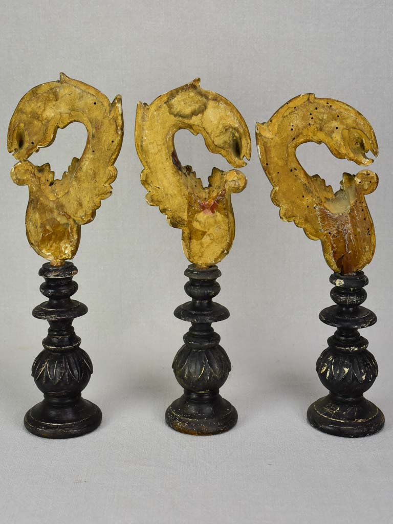 Collection of three salvaged gilt elements mounted on wooden supports 15¾"