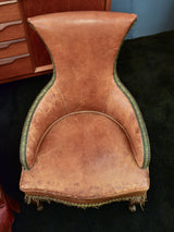 Two vintage slipper chairs - his and hers