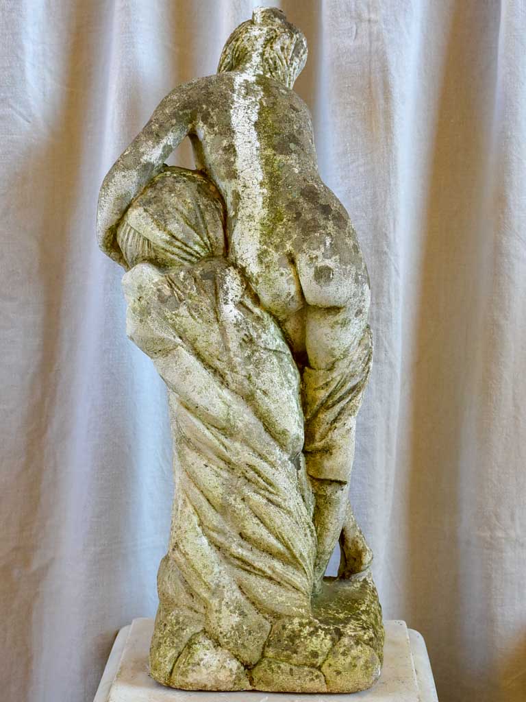 Garden fountain / sculpture of a draped woman with a water jug