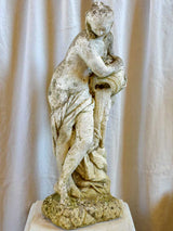 Garden fountain / sculpture of a draped woman with a water jug