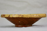 Antique French fruit strainer with yellow and green glaze 9"