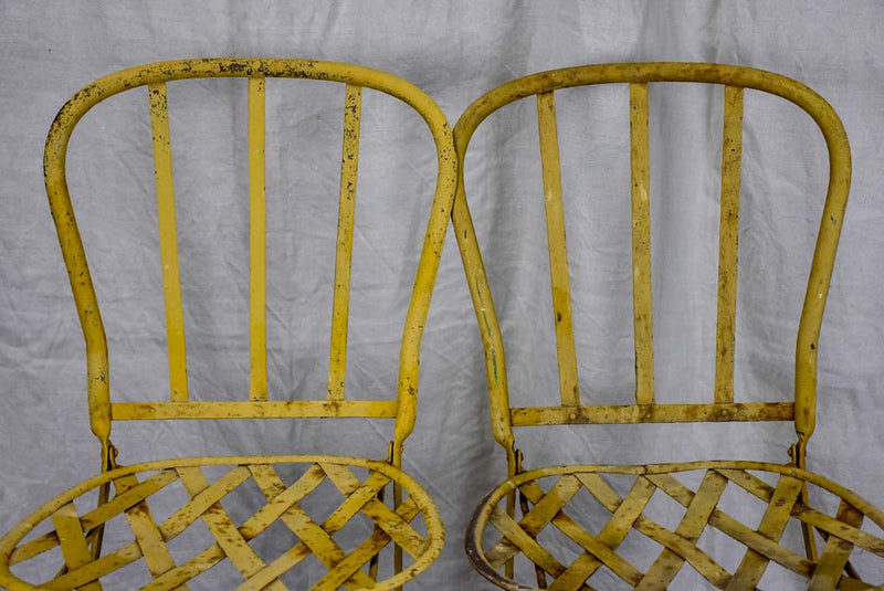 Pair of antique French folding garden chairs - wrought iron