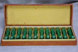 Set of twelve mid century knife rests - green poodles