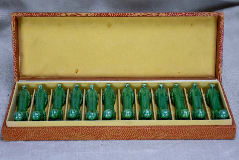 Set of twelve mid century knife rests - green poodles