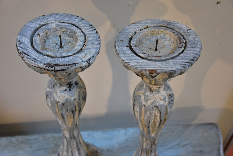 Pair of French candlesticks with white patina