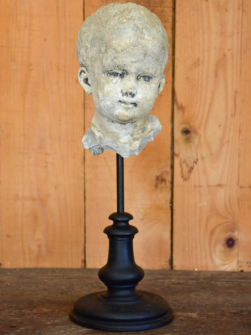 Salvaged mounted antique sculpture