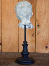 Salvaged mounted antique sculpture