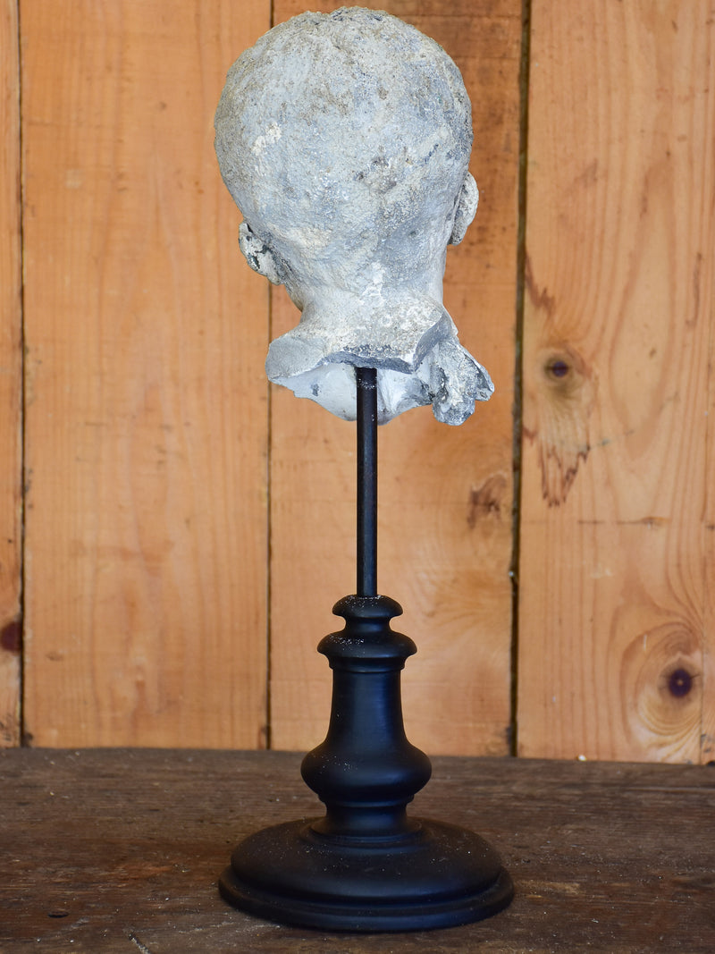 Salvaged mounted antique sculpture