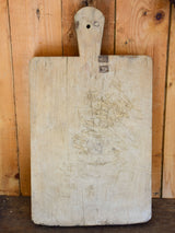 Large French cutting board with repairs and tapered handle