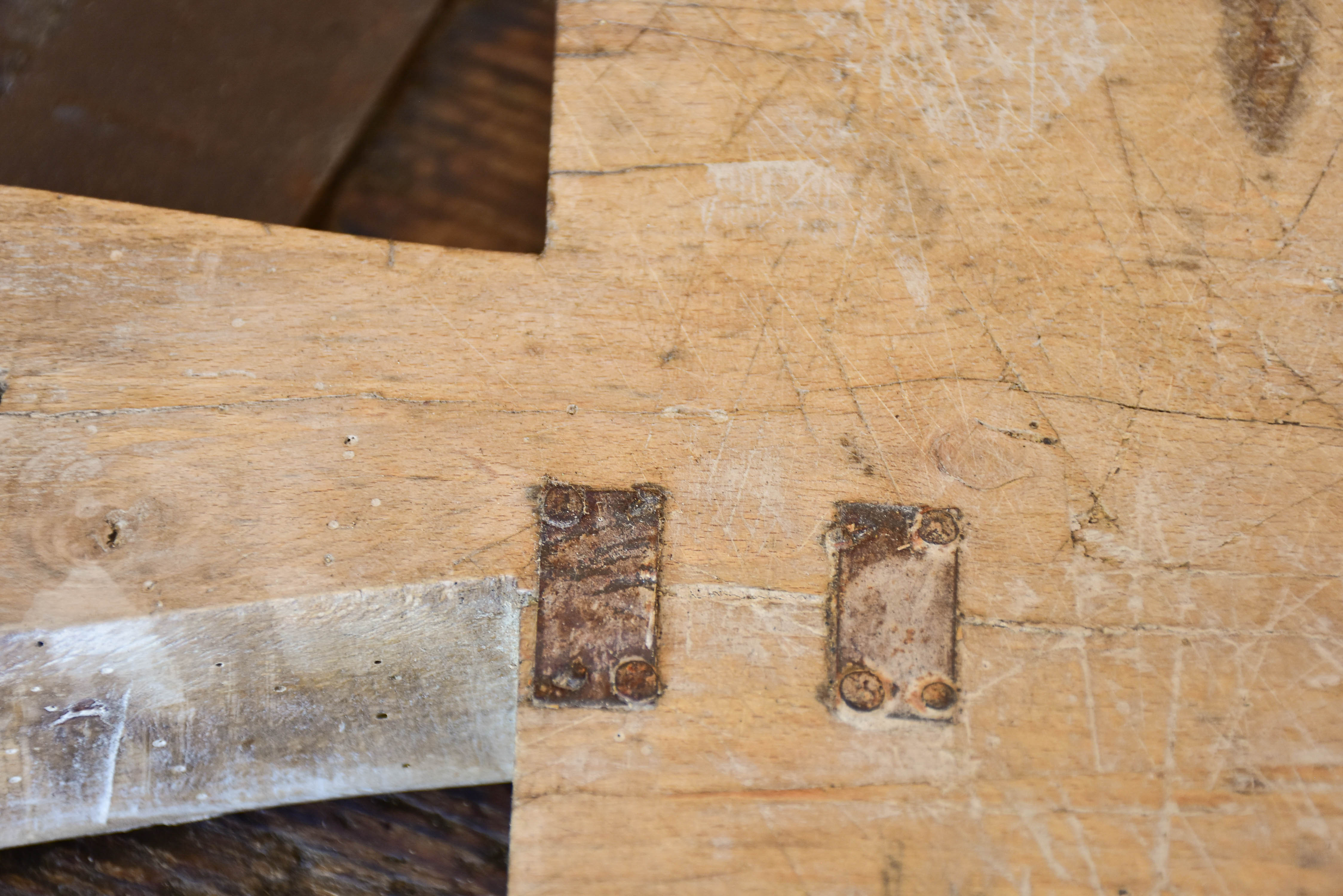 Large French cutting board with repairs and tapered handle
