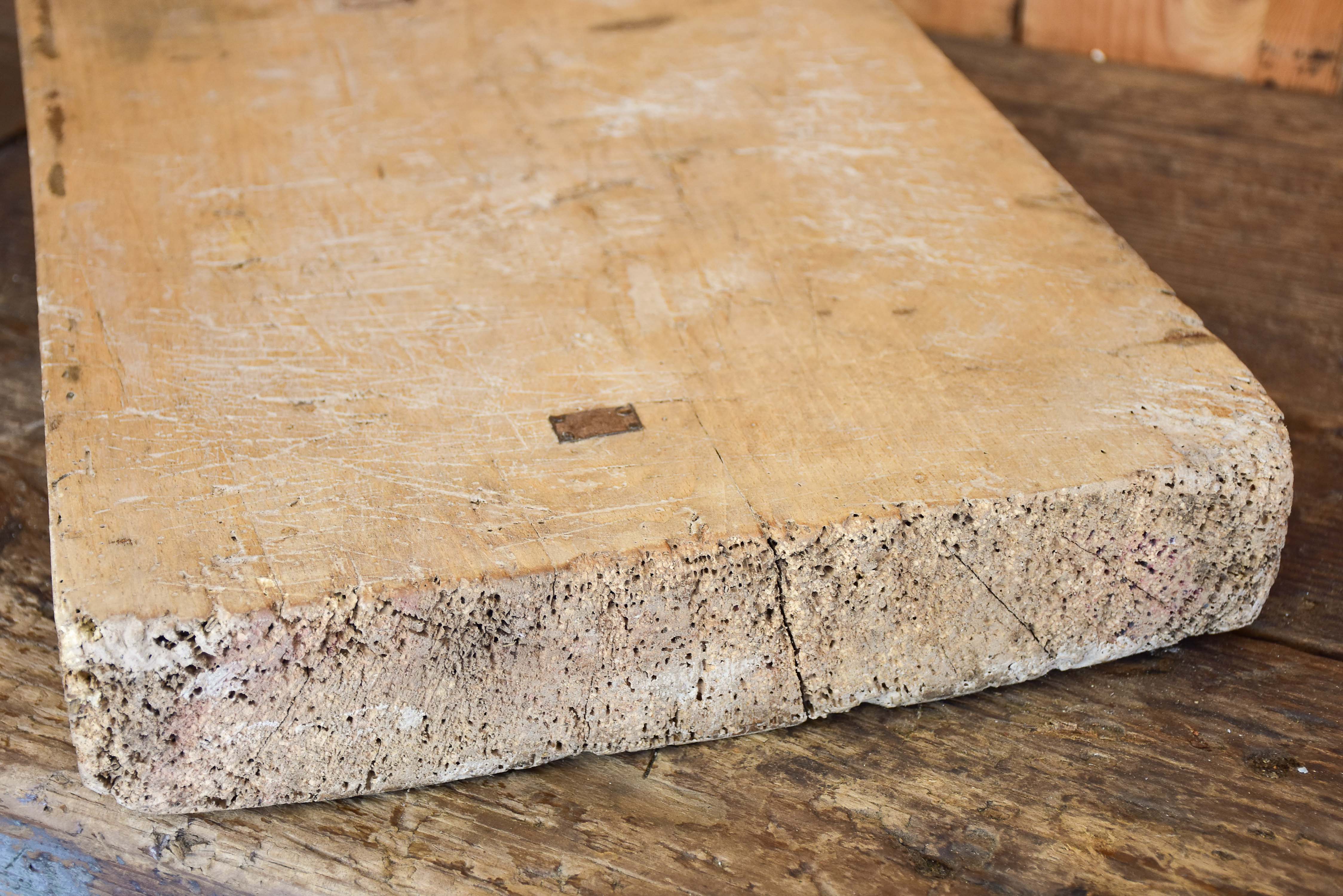 Large French cutting board with repairs and tapered handle