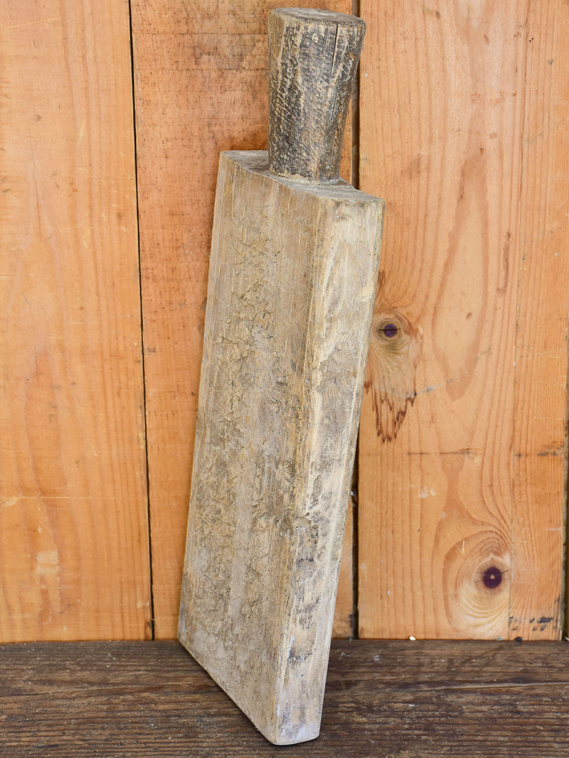 Small antique French cutting board with round handle