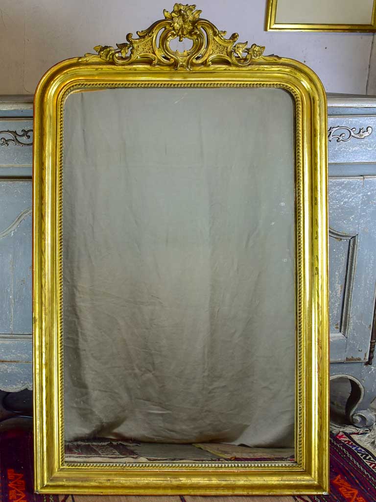 Antique French Louis Philippe mirror with gilded frame and crest 30" x 49¼"