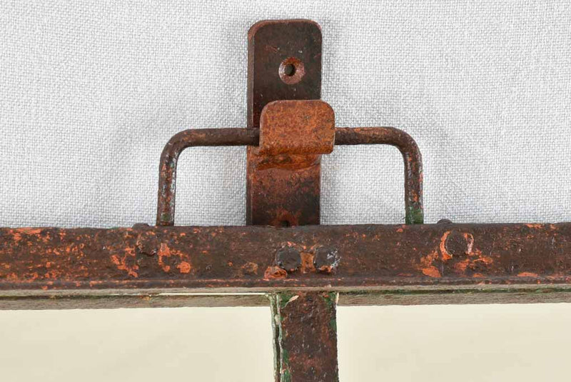 19th century wrought iron framed paneled mirror with red patina 39¾" x 54"