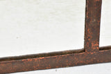 19th century wrought iron framed paneled mirror with red patina 39¾" x 54"