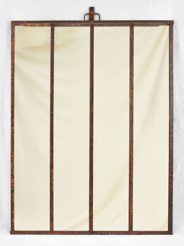 19th century wrought iron framed paneled mirror with red patina 40½" x 52¾"