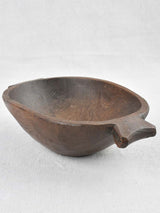 Small primitive wooden bowl w/ fishtail handles 11"