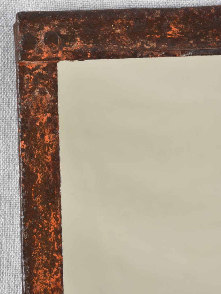 19th century wrought iron framed paneled mirror with red patina 40½" x 52¾"