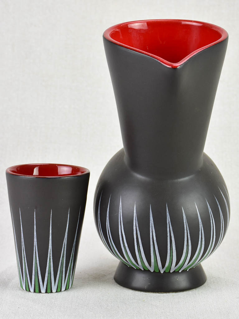 Andre Baud Vallauris set of eight cups and tilted pitcher - black white red and green