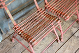 Pair of 19th century branded Arras garden chairs with red patina