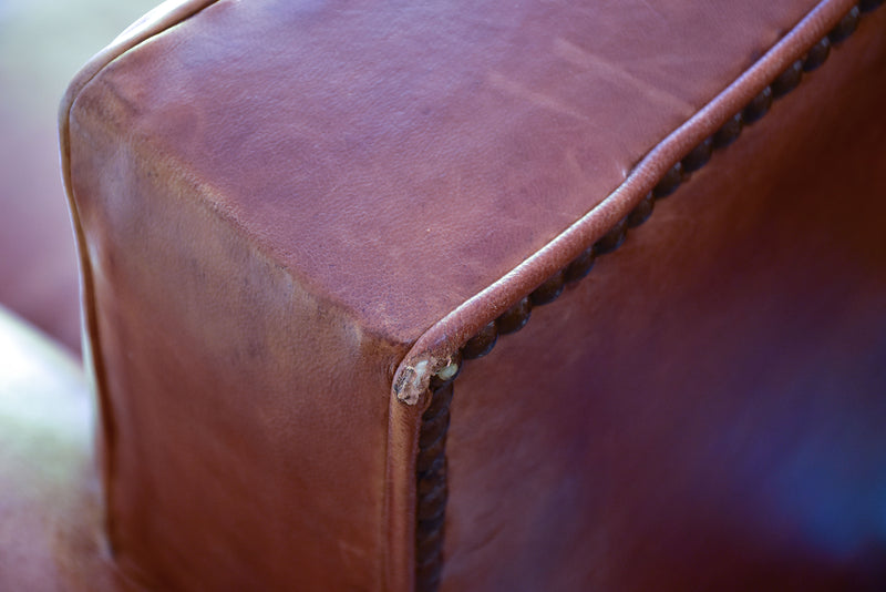 Pair of 1950's moustache back leather club chairs