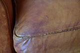 Pair of 1950's moustache back leather club chairs
