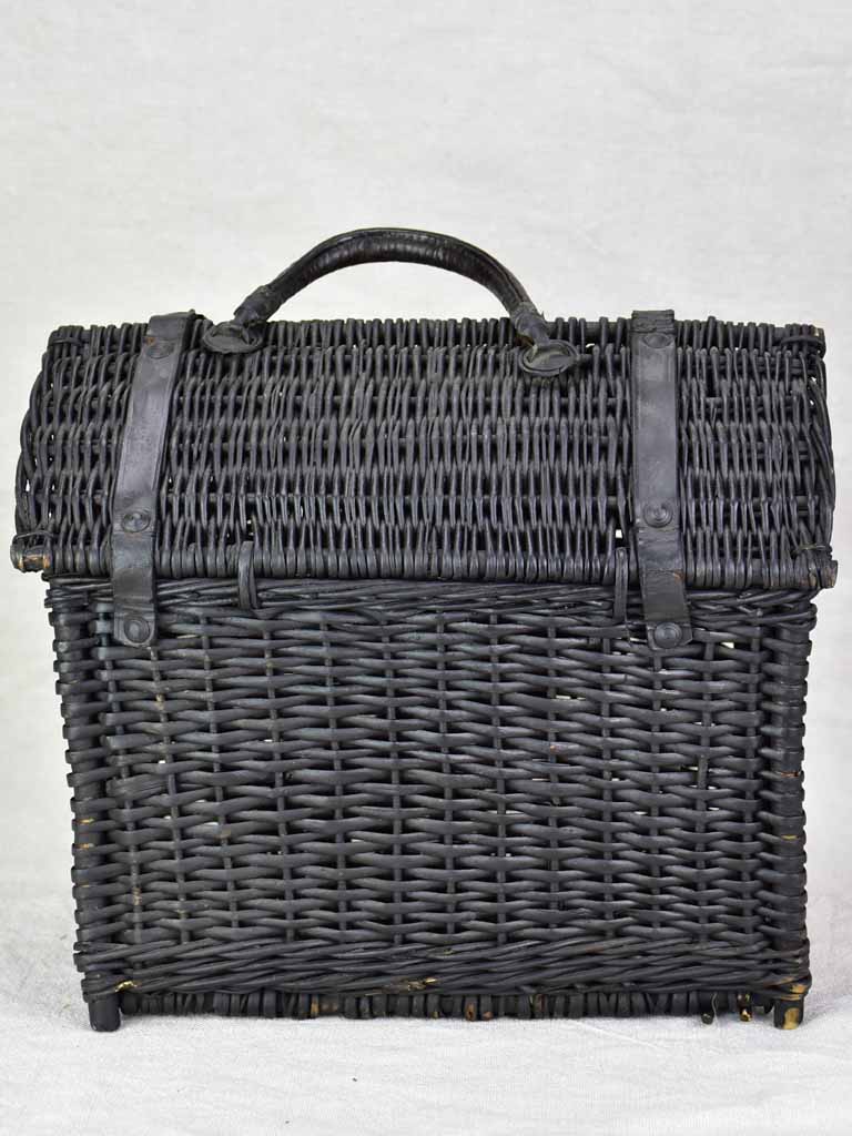 Black wicker lunch basket with two handles