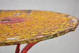 Early twentieth century bistro garden table with yellow and red patina