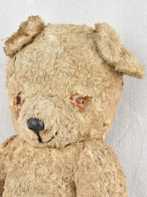 Loved charming straw-filled antique teddy bear