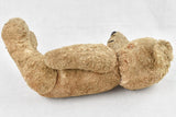 Straw-filled French decorative teddy bear