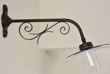 Detailed scrollwork on artisan wall applique