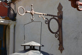 Pair of French wrought iron lanterns with wall brackets