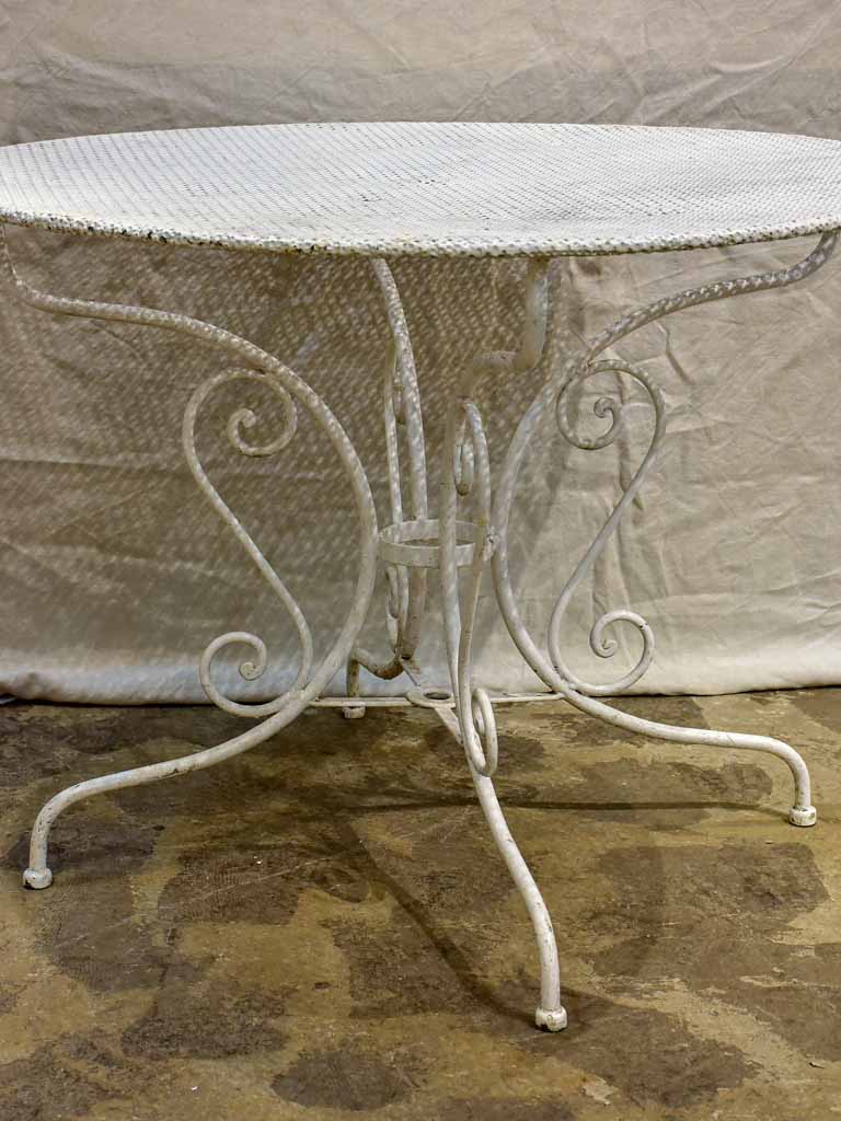 Antique French garden setting - round table and five chairs