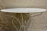 Antique French garden setting - round table and five chairs