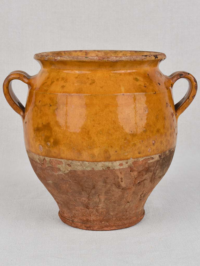 Antique French confit pot with yellow / orange glaze 9"
