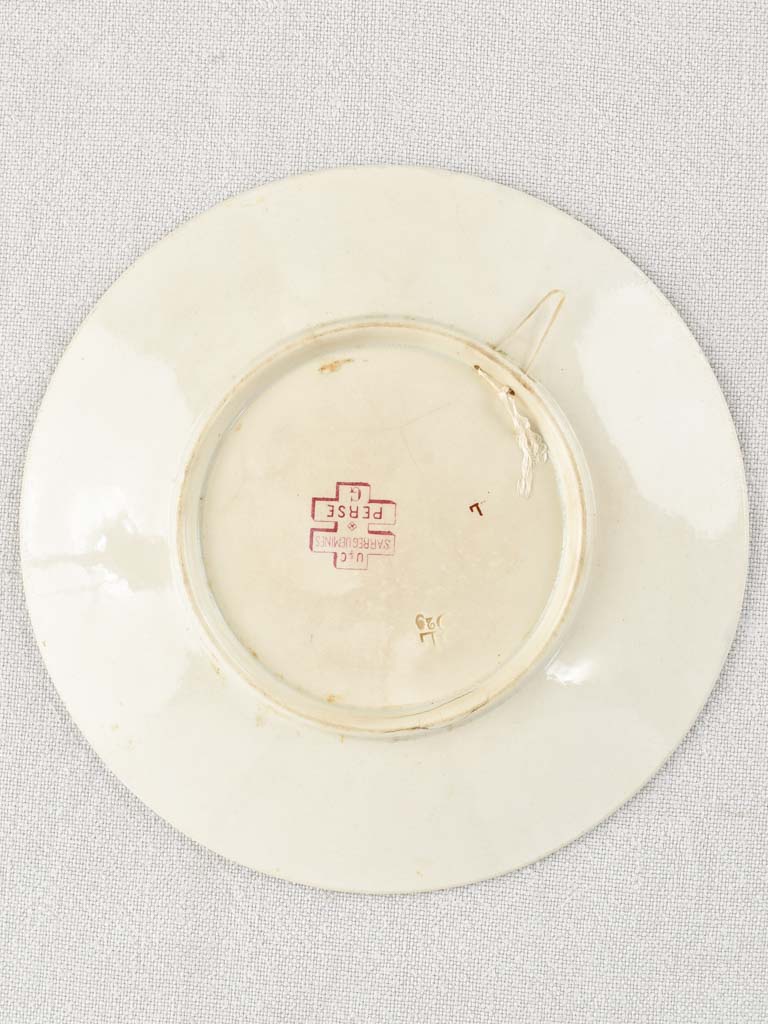 Decorative Sarreguemines plate with minor chips