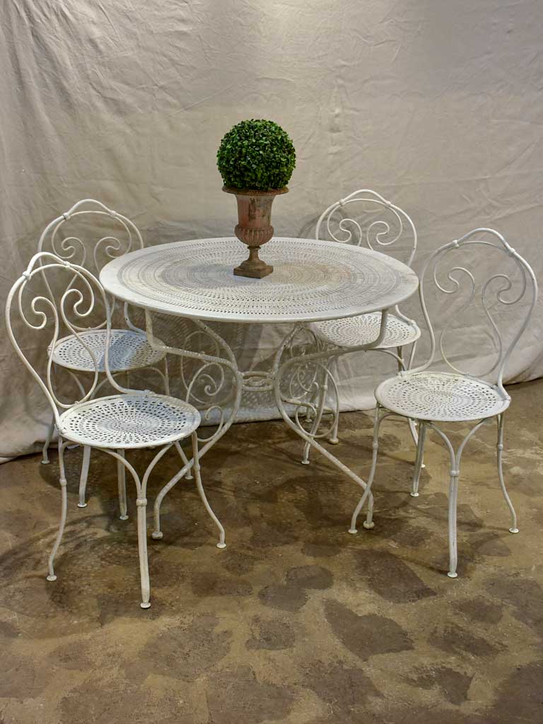 Antique French garden setting - round table and four chairs