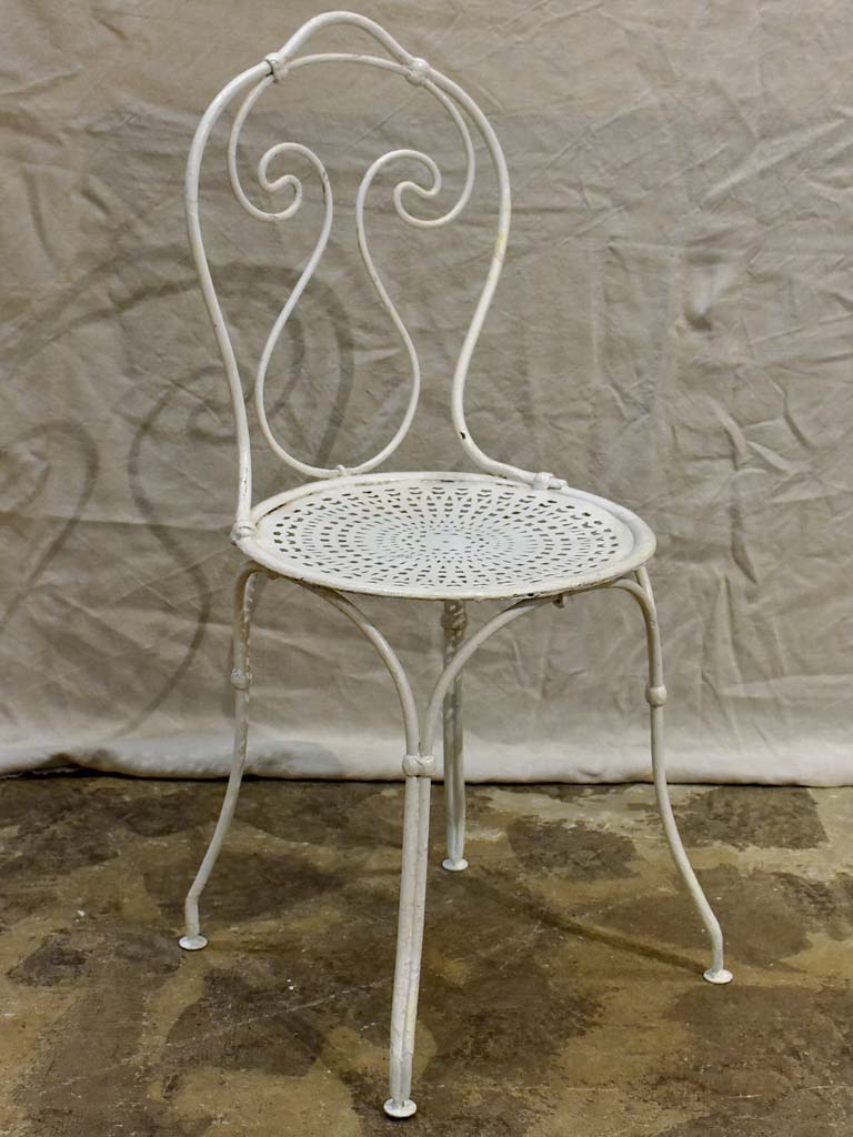 Antique French garden setting - round table and four chairs