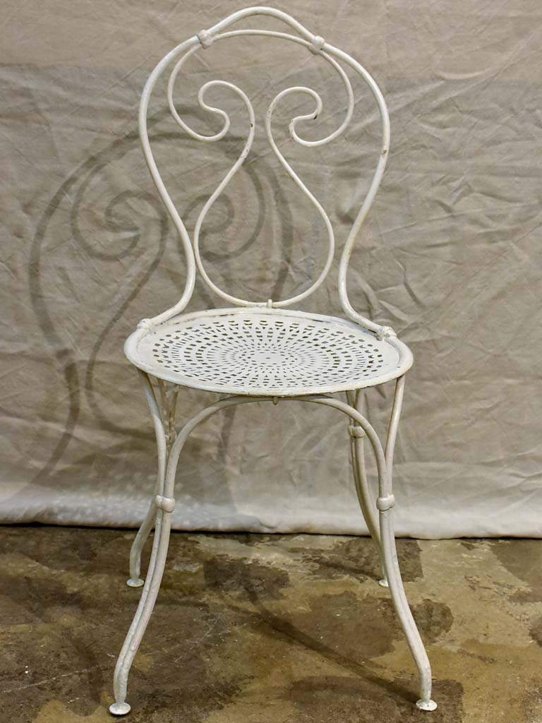 Antique French garden setting - round table and four chairs