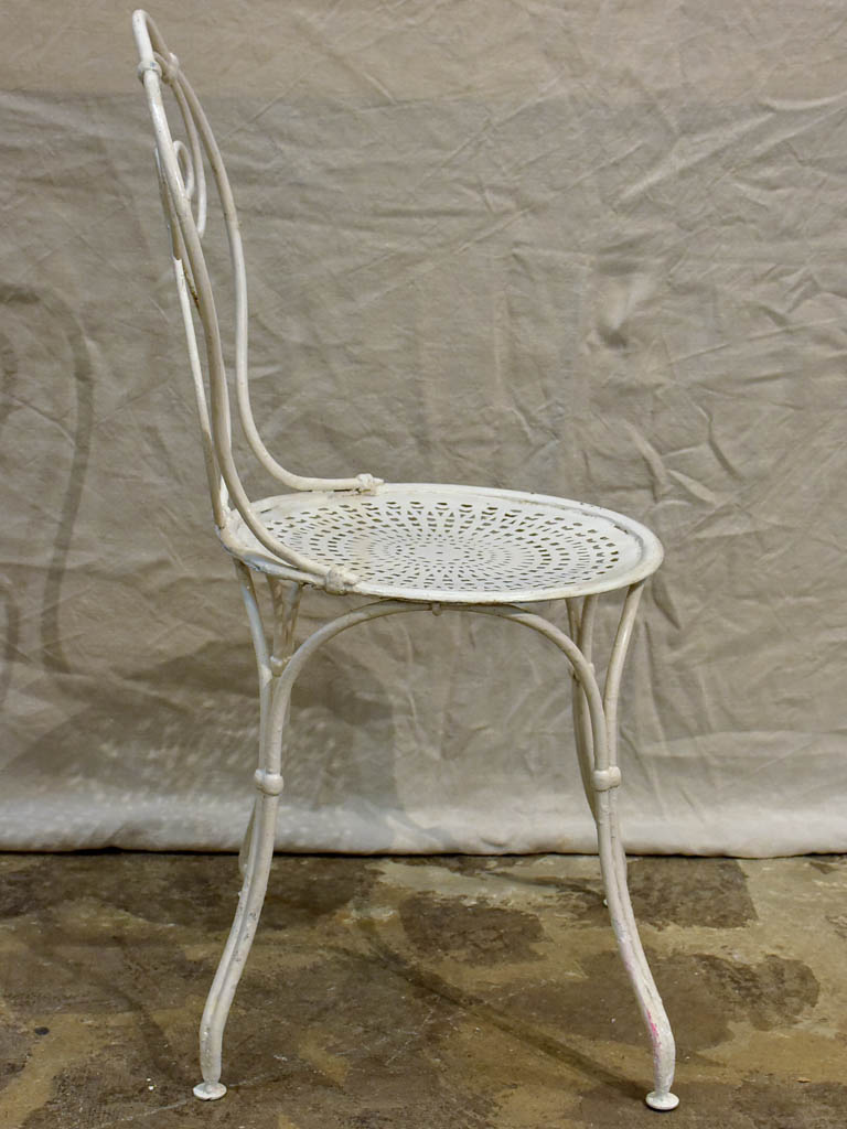 Antique French garden setting - round table and four chairs