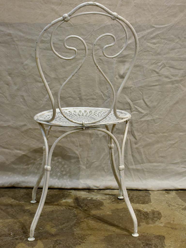 Antique French garden setting - round table and four chairs