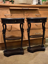 Pair of vintage French oval nightstands with black finish
