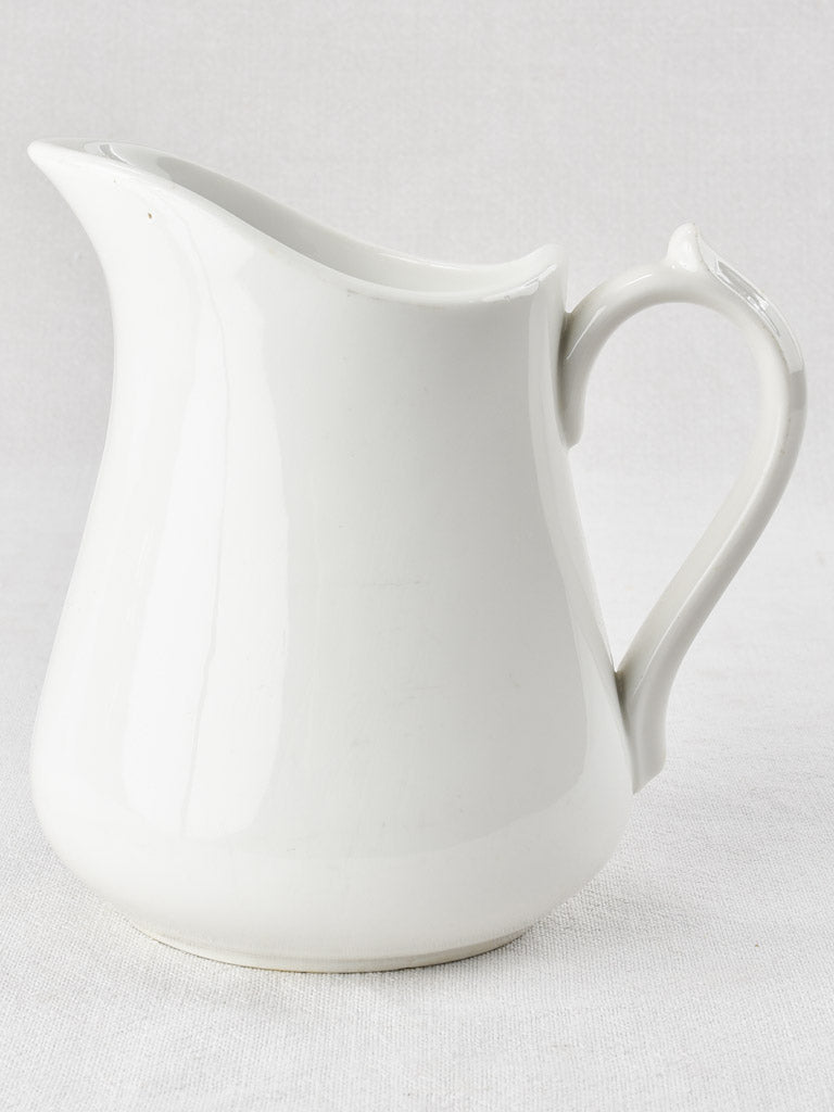 Antique white Limoges porcelain pitcher