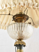 Aged wear on frilly lampshade