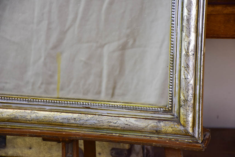 19th century Louis Philippe mirror with silver leaf frame and running pearl 26¾" x 41"