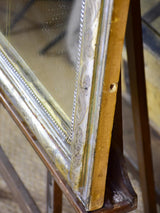 19th century Louis Philippe mirror with silver leaf frame and running pearl 26¾" x 41"