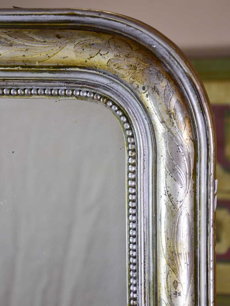 19th century Louis Philippe mirror with silver leaf frame and running pearl 26¾" x 41"